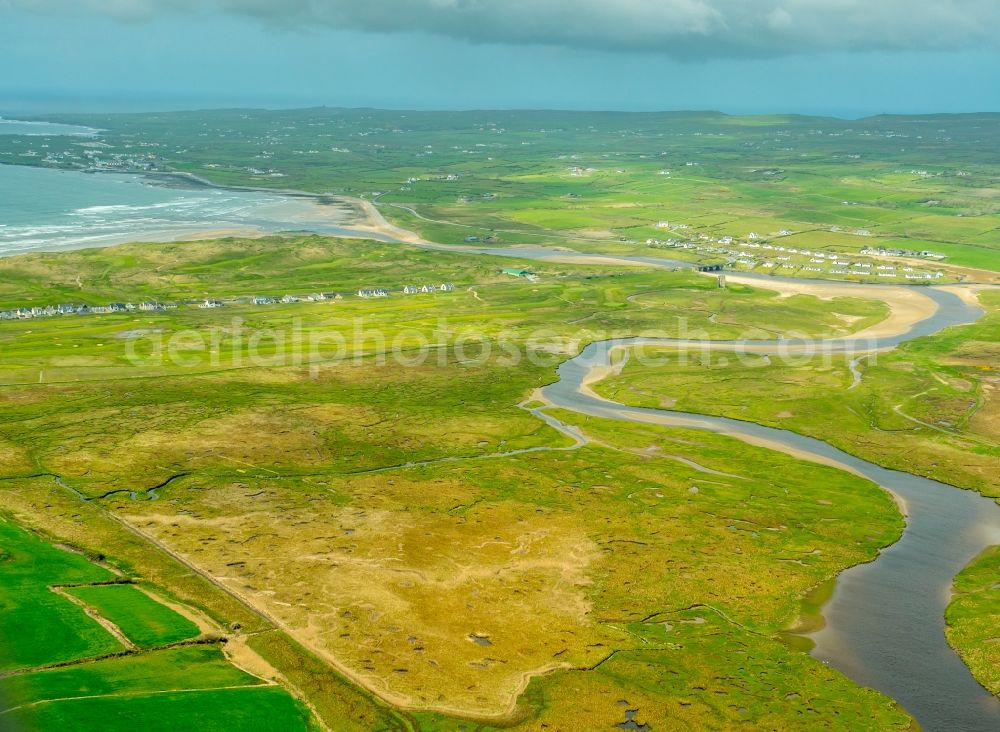 Cloonaveige from the bird's eye view: Curved loop of the riparian zones on the course of the river Inagh River in Cloonaveige in Clare, Ireland