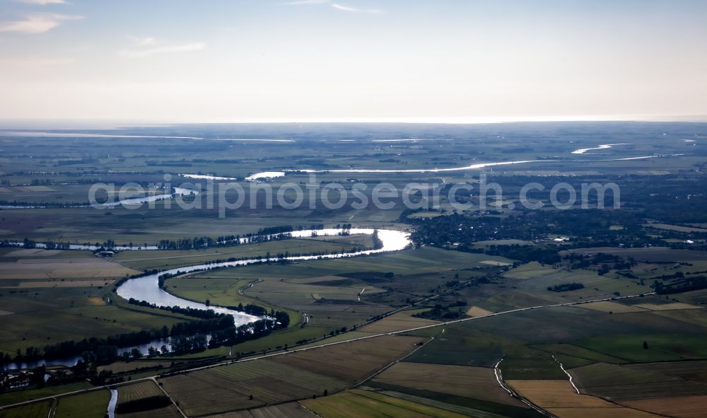 Aerial image Stapel - Shore areas with agricultural land on the Eider - course of the river in Stapel in the state Schleswig-Holstein, Germany