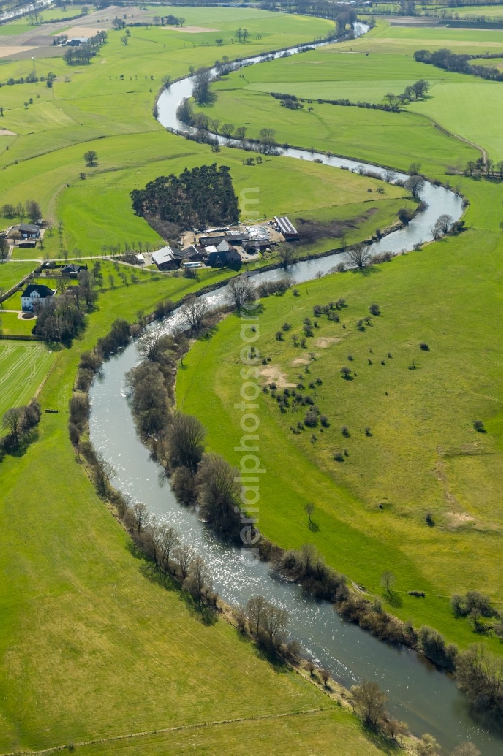 Aerial photograph Hünxe - Curved loop of the riparian zones on the course of the river Lippe in Huenxe in the state North Rhine-Westphalia, Germany