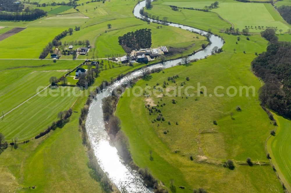 Hünxe from above - Curved loop of the riparian zones on the course of the river Lippe in Huenxe in the state North Rhine-Westphalia, Germany