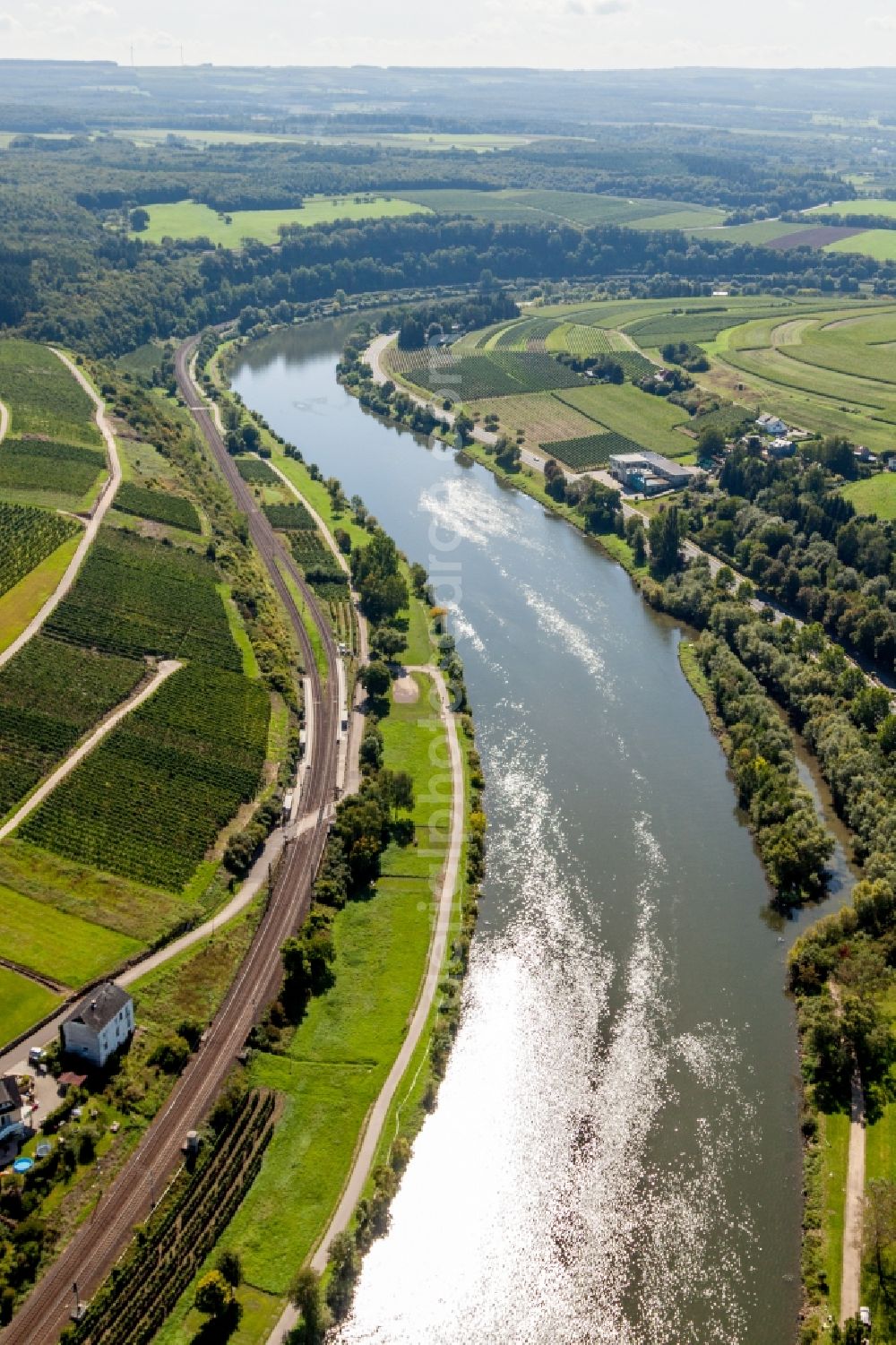 Wehr from above - Curved loop of the riparian zones on the course of the river of Mosel between Luxembourg and Palatinat in Wehr in the state Rhineland-Palatinate, Germany