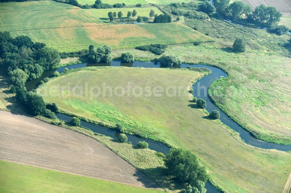 Aerial image Meinersen - Curved loop of the riparian zones on the course of the river Oker in Meinersen in the state Lower Saxony