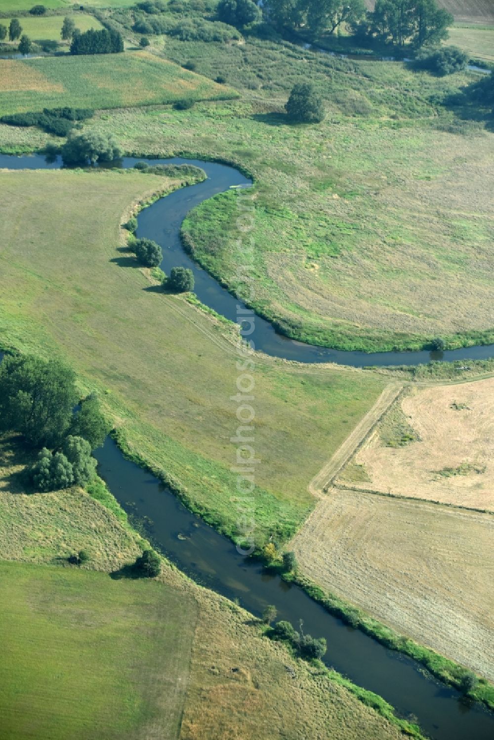 Meinersen from above - Curved loop of the riparian zones on the course of the river Oker in Meinersen in the state Lower Saxony