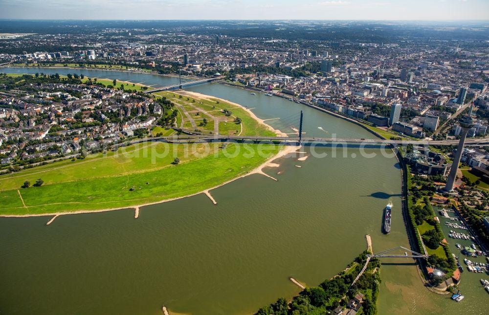 Düsseldorf from the bird's eye view: Curve on the course of the river Rhine and Rheinkniebridge in Duesseldorf in the state North Rhine-Westphalia