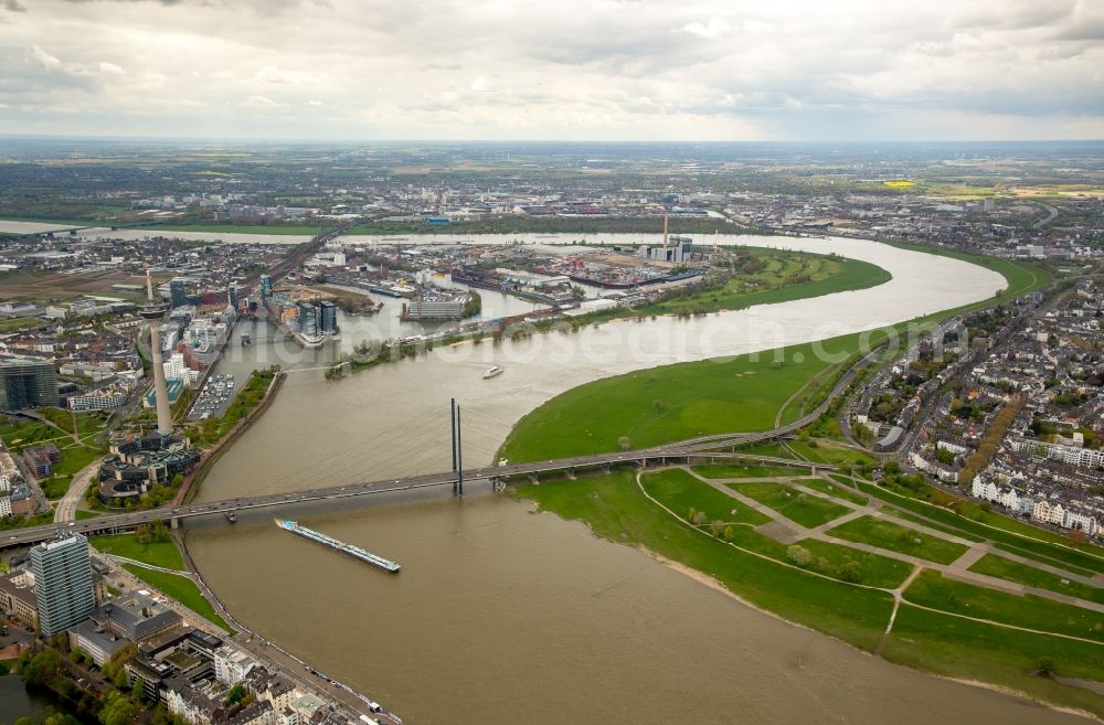 Düsseldorf from the bird's eye view: Course of the river Rhine in the area of Rheinkniebruecke- Bridge in Duesseldorf in the state of North Rhine-Westphalia