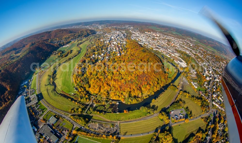 Arnsberg from above - Curved ribbons of riparian areas on autumnal colorful Eichholz deciduous forest at the Ruhr arc flux flow in Arnsberg in North Rhine-Westphalia