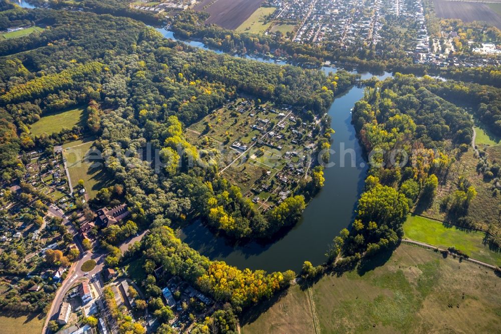 Aderstedt from above - Curved loop of the riparian zones on the course of the river Saale in Aderstedt in the state Saxony-Anhalt, Germany