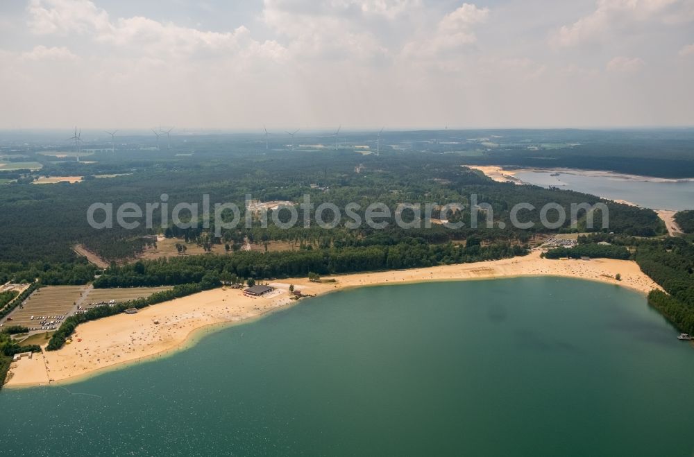 Haltern am See from the bird's eye view: Sandy beach areas on the Silbersee in the district Sythen in Haltern am See in the state North Rhine-Westphalia, Germany