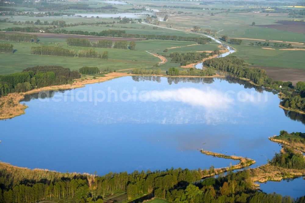 Aerial image Dreetz - Shore areas at the lake area of Lake Dreetz and clouds above the water surface in Dreetz in the federal state Brandenburg, Germany