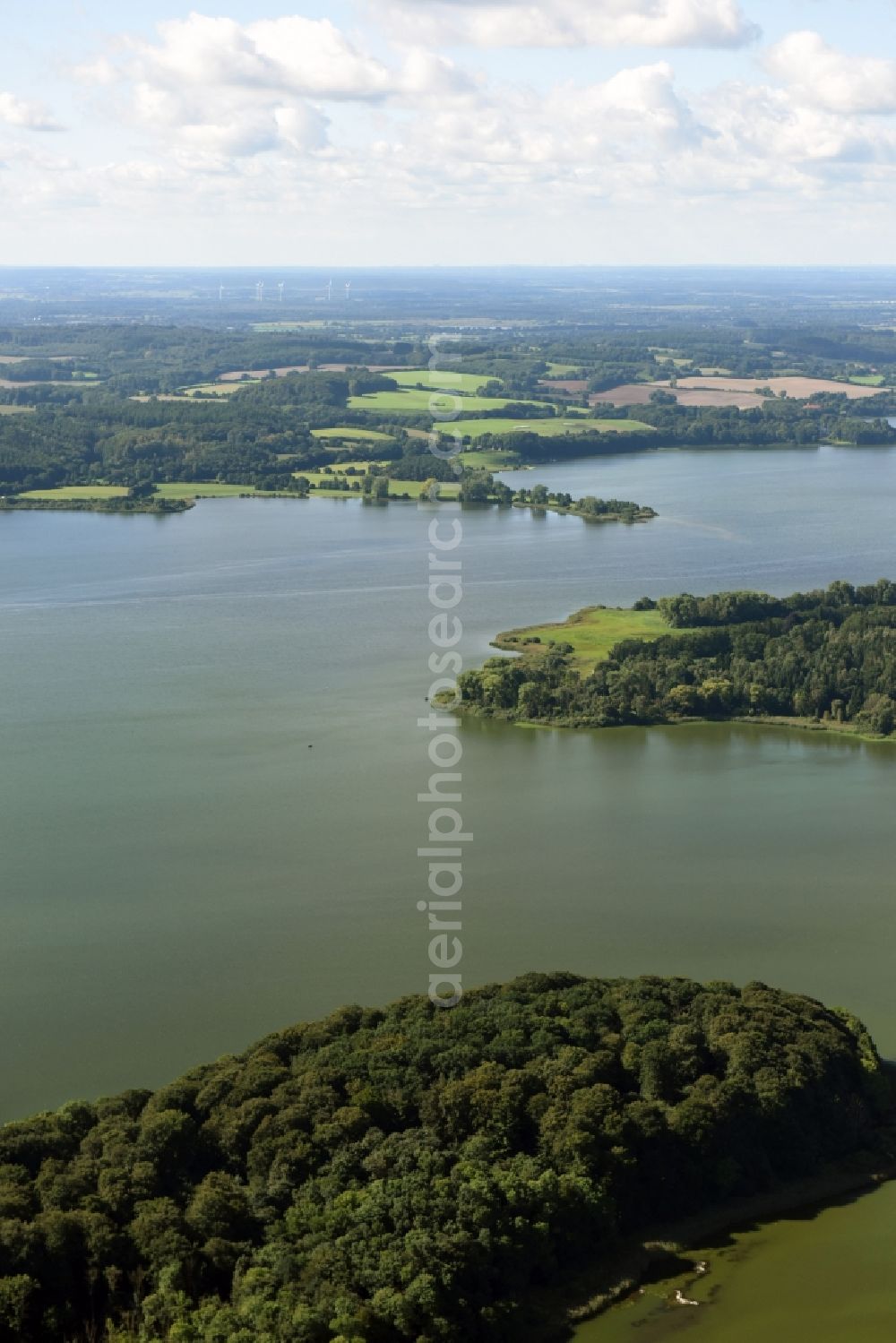 Aerial image Felde - Riparian areas on the lake area of Ahrensee in Felde in the state Schleswig-Holstein