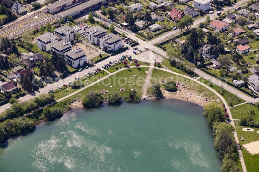 Aerial image Berlin - Riparian areas on the lake area of Biesdorfer Baggersee in Berlin in Berlin, Germany