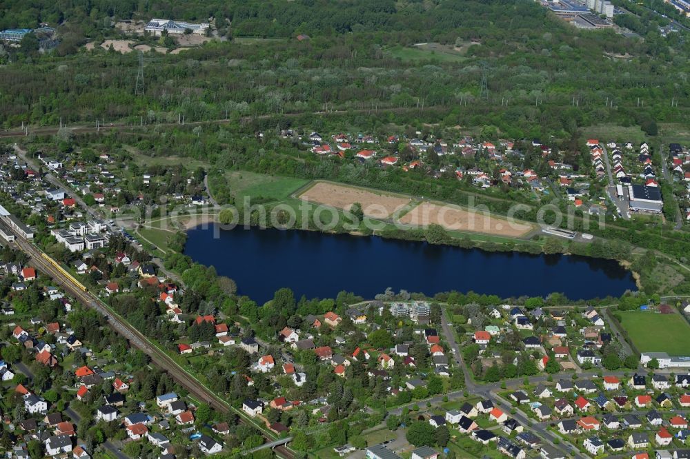 Aerial image Berlin - Riparian areas on the lake area of Biesdorfer Baggersee in the district Biesdorf in Berlin, Germany