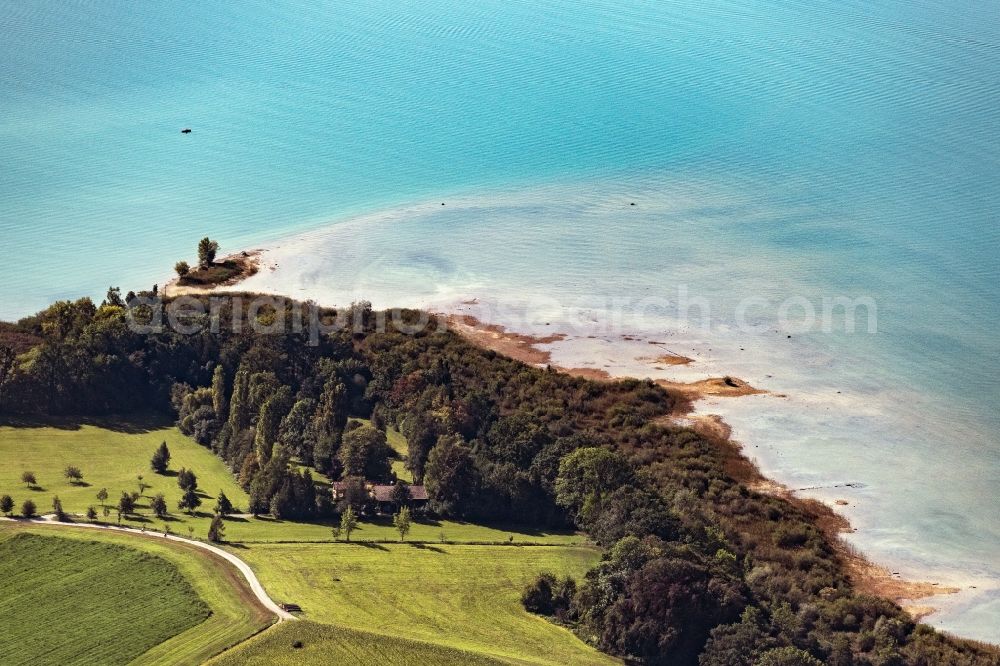 Chieming from above - Riparian areas on the lake area of Chiemsee in Chieming in the state Bavaria, Germany