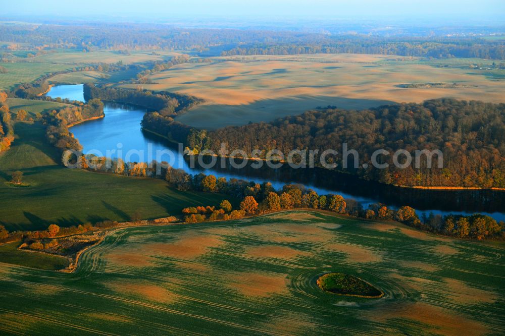 Aerial image Dolgen - Riparian areas on the lake area of Dolgener See in Dolgen Feldberger Seenlandschaft in the state Mecklenburg - Western Pomerania, Germany