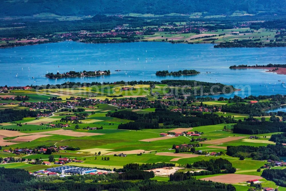 Chiemsee from above - Riparian areas on the lake area of Frauenchiemsee in Chiemsee in the state Bavaria, Germany