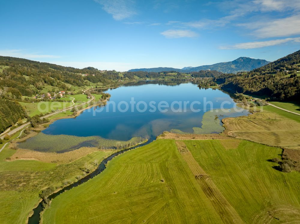 Aerial image Immenstadt im Allgäu - Shore areas at the lake area of Grosser Alpsee in the valley of the mountain landscape in Immenstadt im Allgaeu in the state Bavaria, Germany