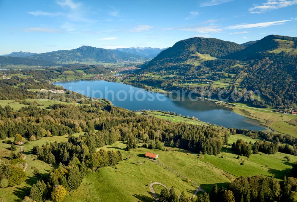 Immenstadt im Allgäu from above - Shore areas at the lake area of Grosser Alpsee in the valley of the mountain landscape in Immenstadt im Allgaeu in the state Bavaria, Germany