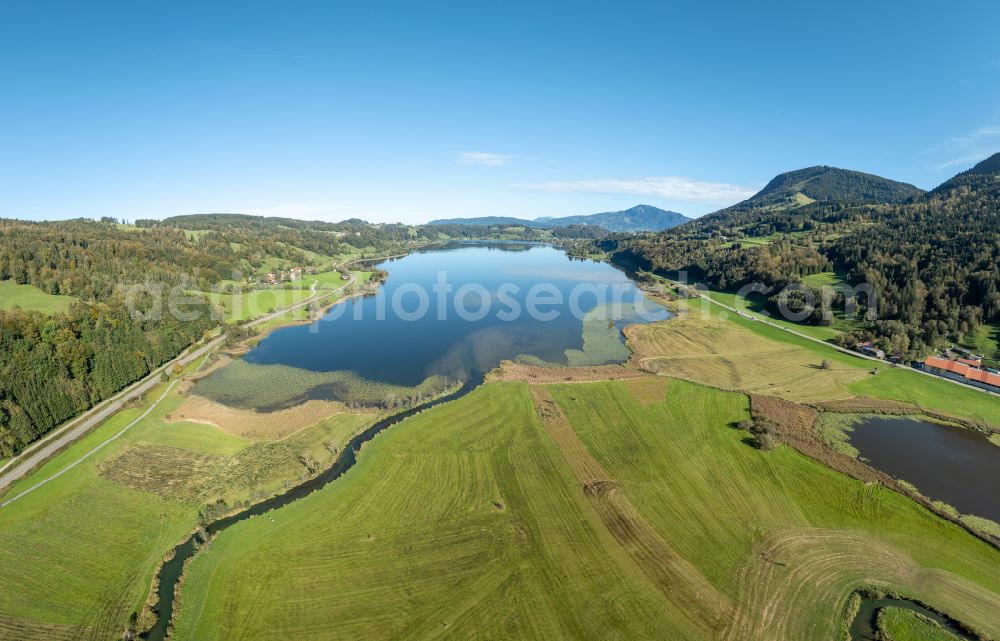 Aerial image Immenstadt im Allgäu - Shore areas at the lake area of Grosser Alpsee in the valley of the mountain landscape in Immenstadt im Allgaeu in the state Bavaria, Germany