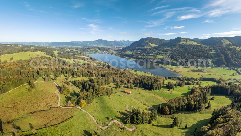 Aerial image Immenstadt im Allgäu - Shore areas at the lake area of Grosser Alpsee in the valley of the mountain landscape in Immenstadt im Allgaeu in the state Bavaria, Germany