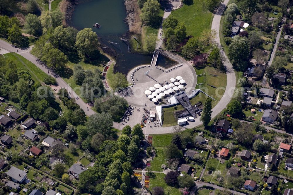 Berlin from the bird's eye view: Riparian areas on the lake area of Hauptsee in the recreation park Britz Garden in Berlin, Germany