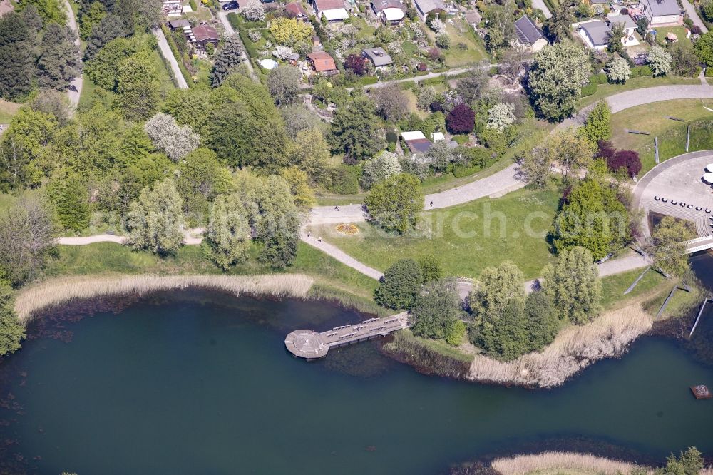 Berlin from above - Riparian areas on the lake area of Hauptsee in the recreation park Britz Garden in Berlin, Germany