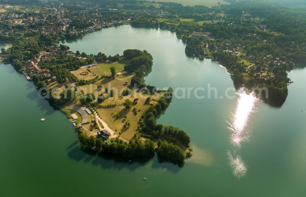 Feldberger Seenlandschaft from the bird's eye view: Riparian areas on the lake area of Haussee with residential area and forest in the district Feldberg in Feldberger Seenlandschaft in the state Mecklenburg - Western Pomerania