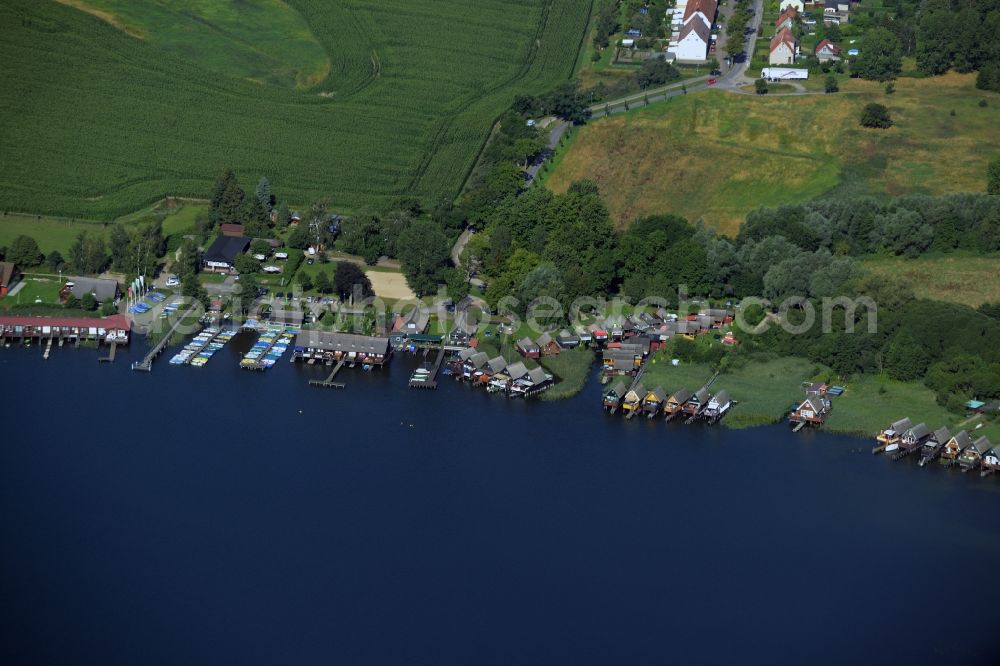 Güstrow from above - Riparian areas on the lake area of the Inselsee with piers in Guestrow in the state Mecklenburg - Western Pomerania