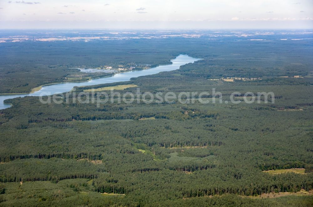 Aerial image Pilawki - Riparian areas on the lake area of Jezioro Drweckie - Drewenzer See in a forest area in Pilawki in Warminsko-Mazurskie, Poland