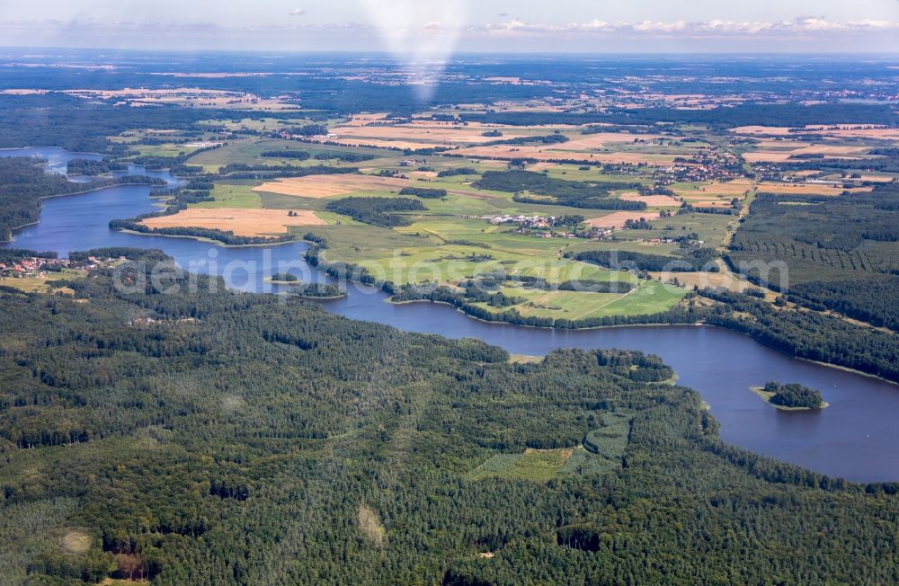 Pilawki from above - Riparian areas on the lake area of Jezioro Drweckie - Drewenzer See in a forest area in Pilawki in Warminsko-Mazurskie, Poland