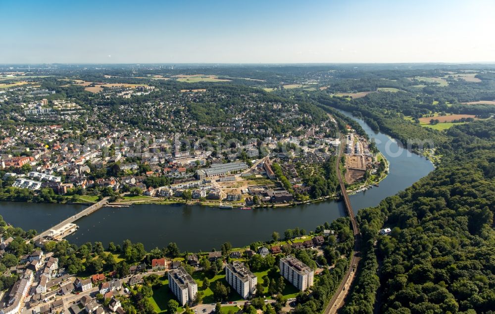 Essen from the bird's eye view: Riparian areas on the lake area of Kettwiger See in Essen in the state North Rhine-Westphalia. Also shown the bridge of the Ringstrasse, a rail bridge and the ferry