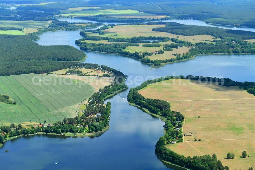 Kleinzerlang from above - Riparian areas on the lake area of Kleiner Paelitzsee in Kleinzerlang in the state Brandenburg, Germany