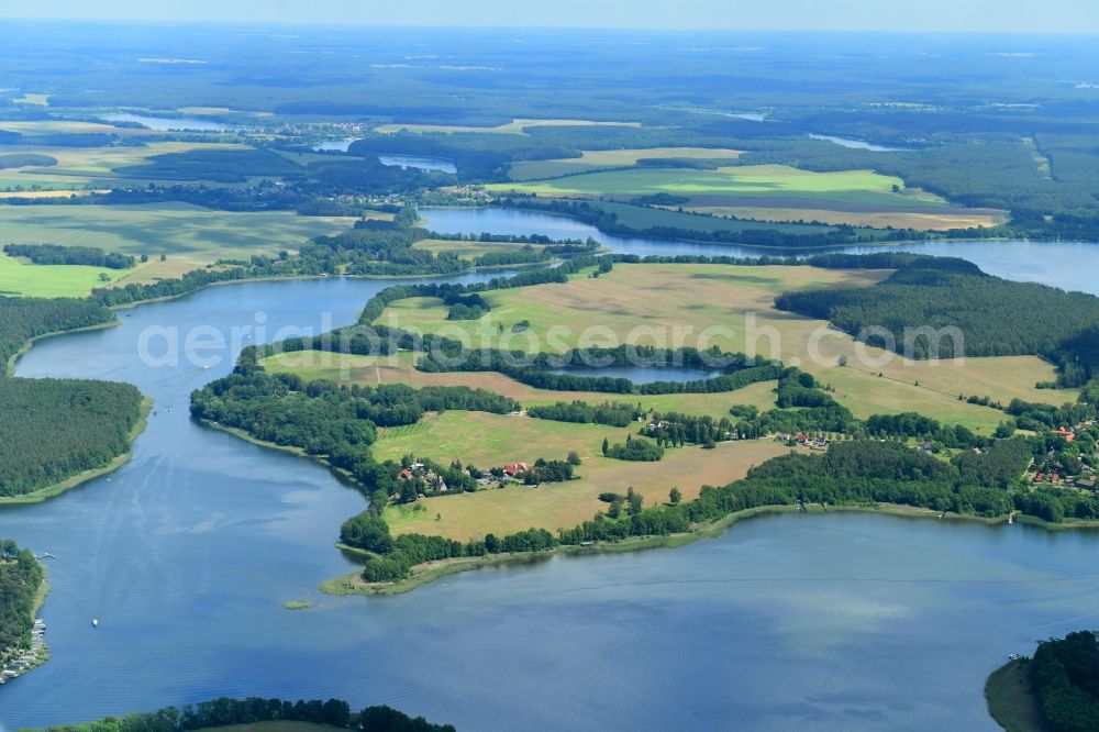 Aerial image Kleinzerlang - Riparian areas on the lake area of Kleiner Paelitzsee in Kleinzerlang in the state Brandenburg, Germany