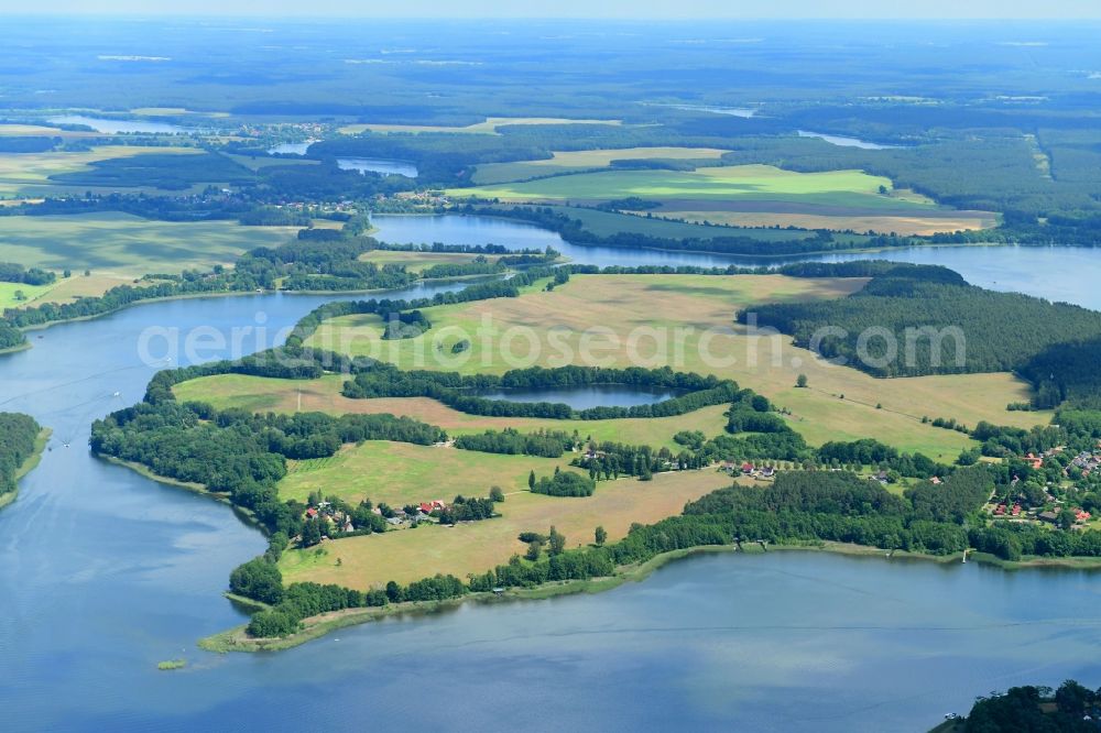 Aerial photograph Kleinzerlang - Riparian areas on the lake area of Kleiner Paelitzsee in Kleinzerlang in the state Brandenburg, Germany