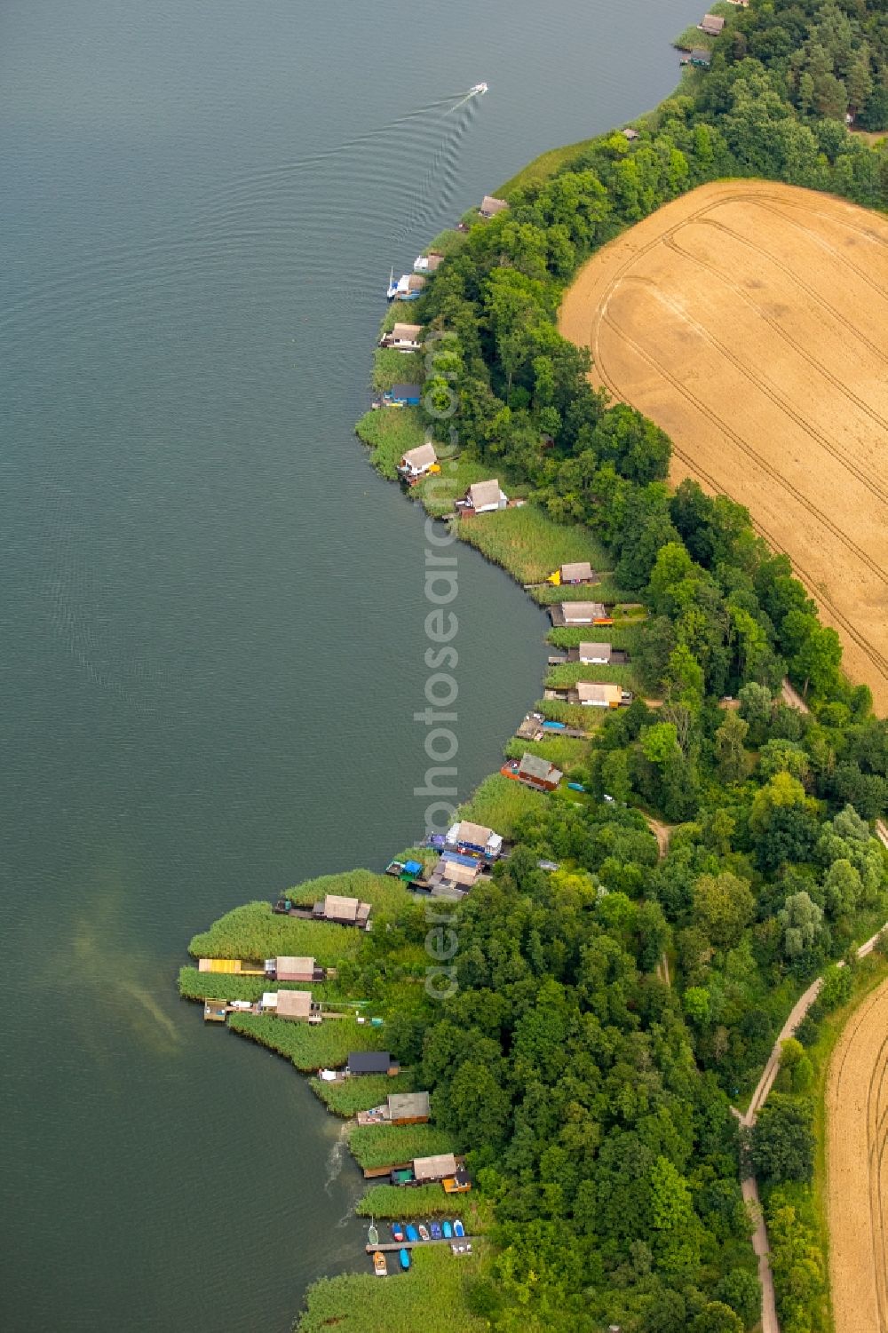 Krakow am See from the bird's eye view: Riparian areas on the lake area of Krakower See in Krakow am See in the state Mecklenburg - Western Pomerania