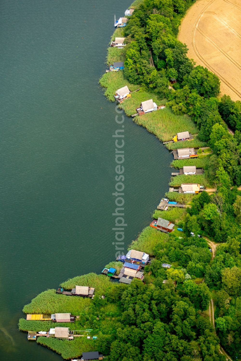 Krakow am See from the bird's eye view: Riparian areas on the lake area of Krakower See in Krakow am See in the state Mecklenburg - Western Pomerania