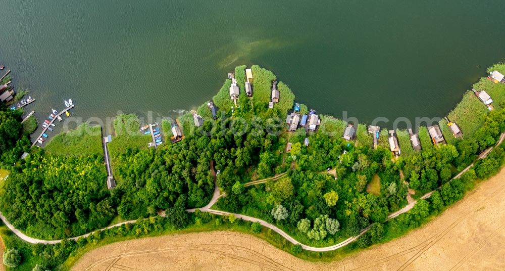 Aerial image Krakow am See - Riparian areas on the lake area of Krakower See in Krakow am See in the state Mecklenburg - Western Pomerania