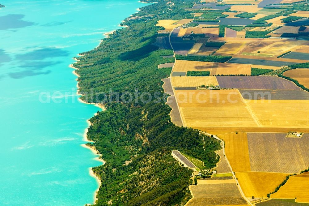 Aerial image Moustiers-Sainte-Marie - Riparian areas on the lake area of Lac de Sainte-Croix and sun flower fields in Moustiers-Sainte-Marie in Provence-Alpes-Cote d'Azur, France