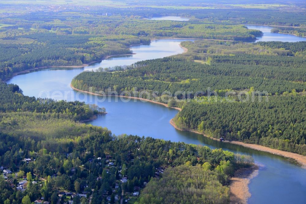 Ahrensdorf from above - Riparian areas on the sea area of Luebbesee near Ahrensdorf in the state Brandenburg