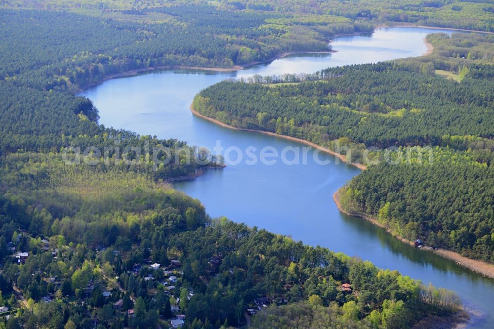 Ahrensdorf from the bird's eye view: Riparian areas on the sea area of Luebbesee near Ahrensdorf in the state Brandenburg