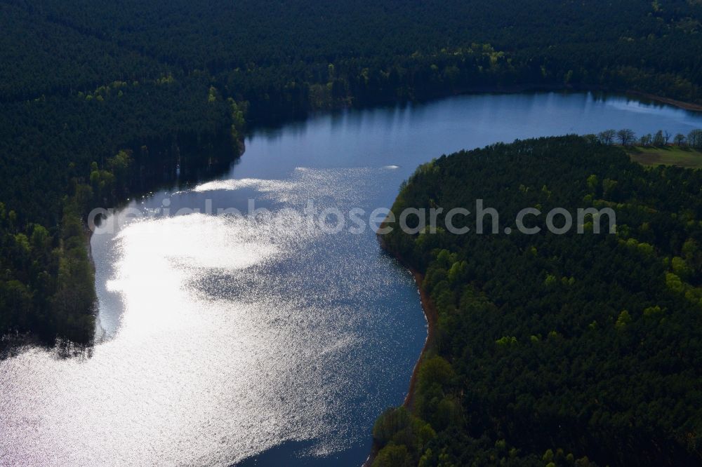 Ahrensdorf from above - Riparian areas on the sea area of Luebbesee near Ahrensdorf in the state Brandenburg