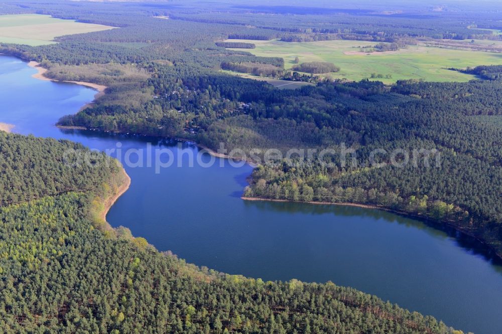 Ahrensdorf from the bird's eye view: Riparian areas on the sea area of Luebbesee near Ahrensdorf in the state Brandenburg