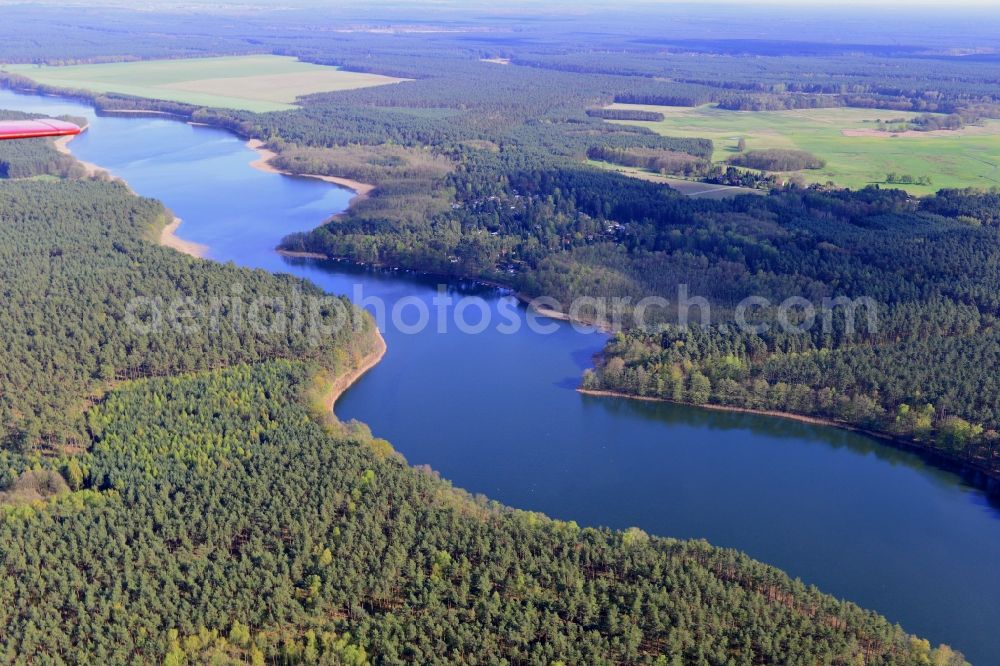 Aerial image Ahrensdorf - Riparian areas on the sea area of Luebbesee near Ahrensdorf in the state Brandenburg