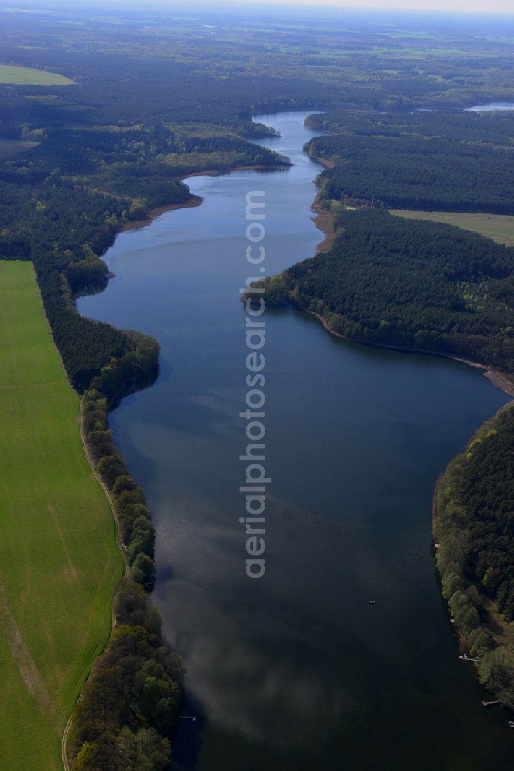 Templin from the bird's eye view: Riparian areas on the lake area of Luebbesee in a forest area in Templin in the state Brandenburg, Germany