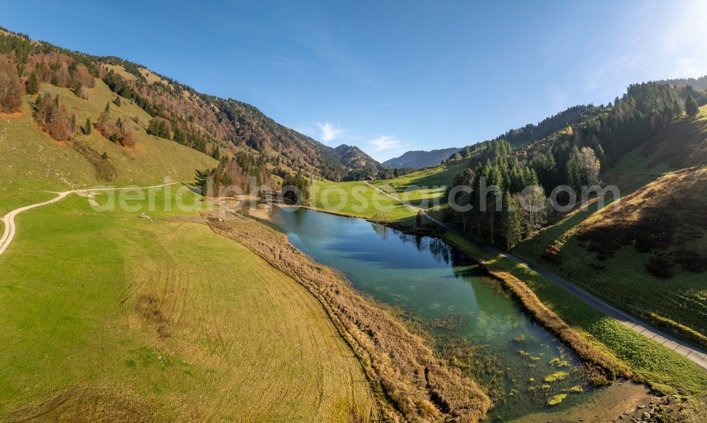 Hochleckach from above - Shore areas at the lake area of Leckner See in the valley of the mountain landscape on street Hofle in Hochleckach Allgaeu in Vorarlberg, Austria