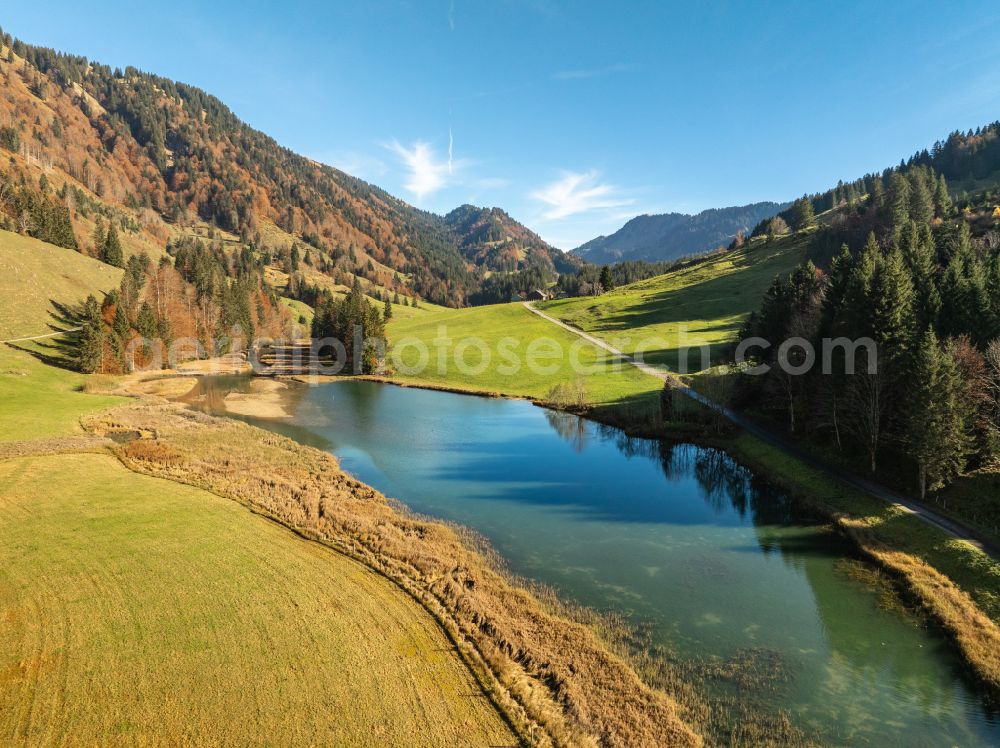 Hochleckach from above - Shore areas at the lake area of Leckner See in the valley of the mountain landscape on street Hofle in Hochleckach Allgaeu in Vorarlberg, Austria