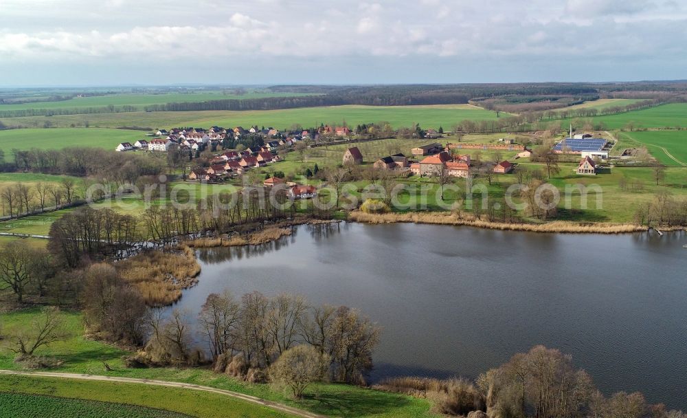 Lietzen from the bird's eye view: Riparian areas on the lake area of Lietzener See in Lietzen in the state Brandenburg, Germany