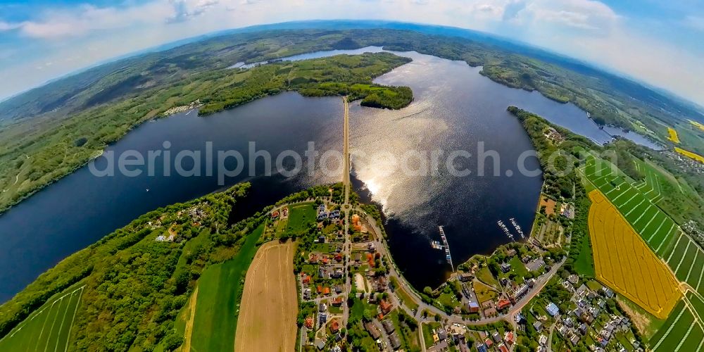 Delecke from the bird's eye view: Riparian areas on the lake area of Moehnesee in Delecke in the state North Rhine-Westphalia