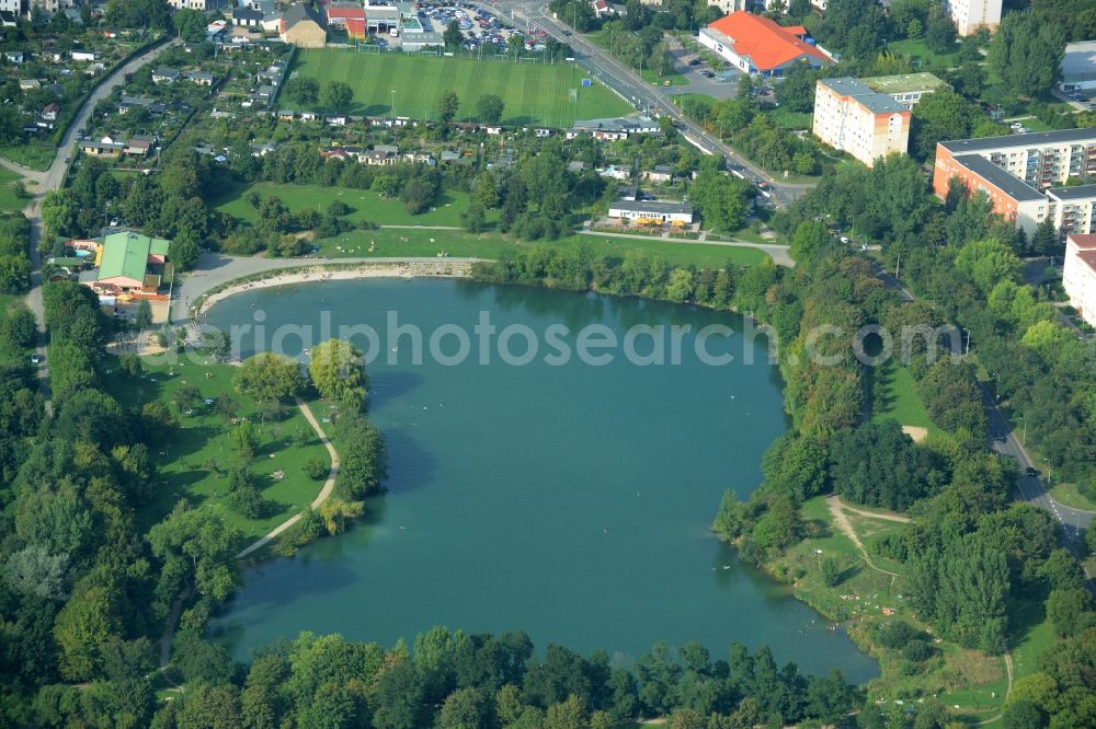 Leipzig from the bird's eye view: Riparian areas on the lake area of Nature bath Northeast (Bagger) in Leipzig in the state of Saxony. The lake was created through a former gravel pit and mining location