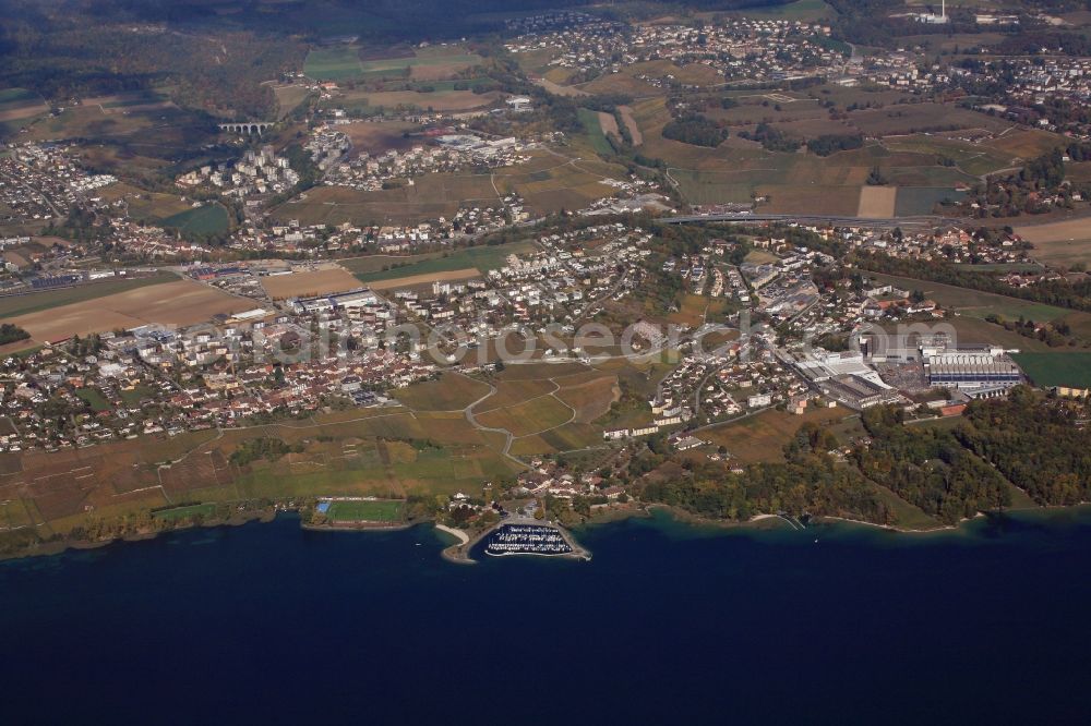 Aerial image Cortaillod - Waterfront landscape on the lake Neuchateler See in Cortaillod in the canton Neuchatel, Switzerland