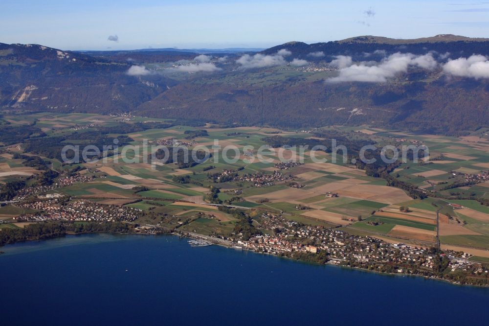 Grandson from the bird's eye view: Waterfront landscape and mountains of the Swiss Jura at the lake Neuchateler See in Grandson in the canton Vaud, Switzerland